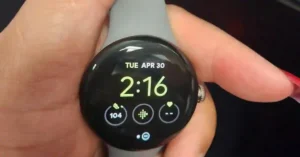 Google Pixel Watch on a wrist displaying a notification that the connected Android phone has been left behind.