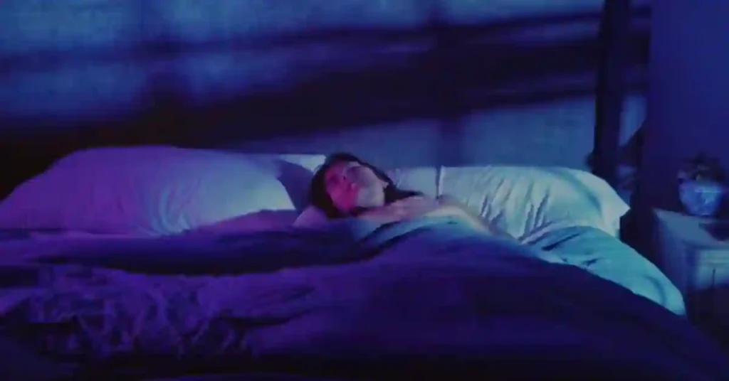 Want a Better Garmin Sleep Score? Here’s What Works 1 Close-up of relaxed person sleeping in low light, supporting deep sleep and high Garmin sleep score
