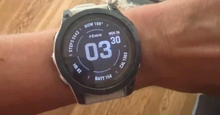 Garmin Fenix 7 smartwatch showing update screen with version 23.05 improvements and bug fixes