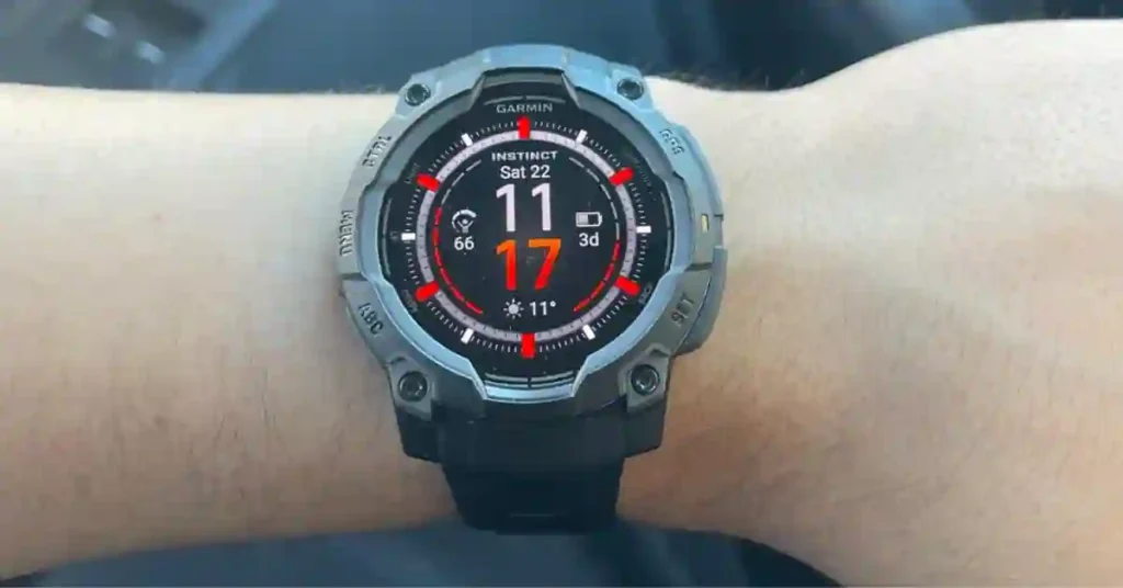 Garmin Instinct 3 smartwatch displaying beta version 10.15 update screen, highlighting real-life improvements and new features.