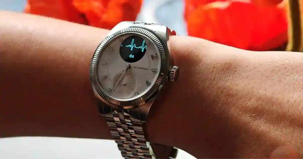 IFA 2025: Wearables Preview from Amazfit, Whoop & More 4 Withings ScanWatch Nova with analog hands and digital display showing ECG in action.