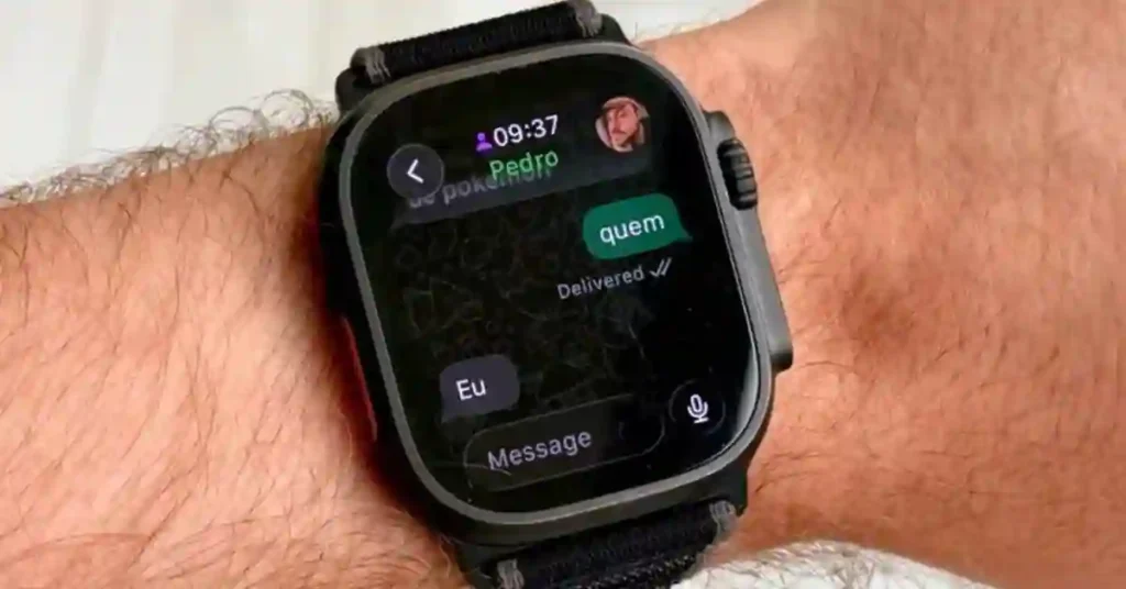 WhatsApp on Apple Watch: First Look, Features, & 2025 Release 1 User viewing the WhatsApp chat list interface on the Apple Watch screen.