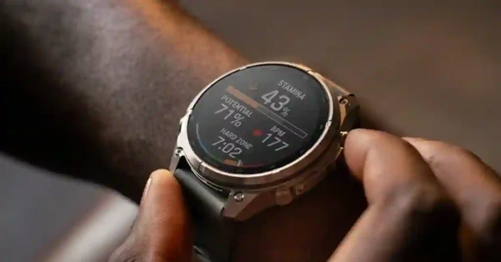 Garmin Fenix 9 & 9 Pro: Price, Specs & Which to Buy (2026) 5 Close-up of the Garmin Fenix 9 Pro titanium case and 3,000-nit AMOLED display.