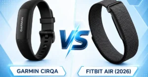 Side-by-side comparison of the screenless Fitbit Air pebble tracker in its silicone loop and the leaked minimalist Garmin Cirqa black fabric band.