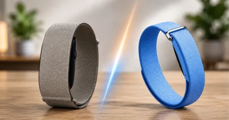 Garmin Cirqa vs Fitbit Air (2026): Which Screenless Tracker to Buy? Garmin Cirqa fabric band and Fitbit Air pebble tracker side by side comparison