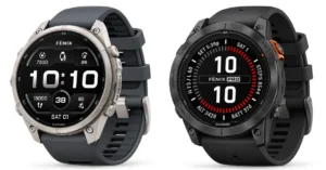Garmin Fenix 9 and Fenix 7 smartwatches side by side, comparing display, battery life, and features